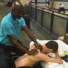 Man In Wheelchair Getting Shoulder Massage